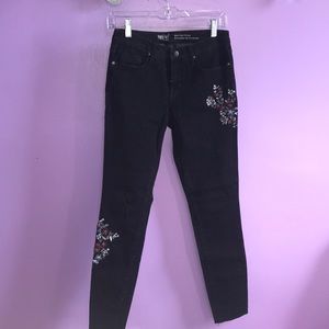 Black jeans with floral embroidery